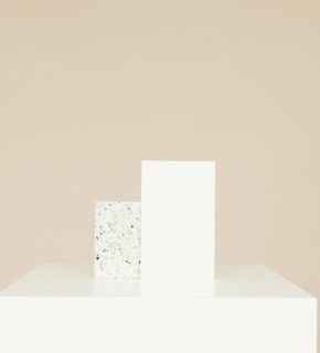 Simple minimalist mockup featuring two blocks on a neutral background.