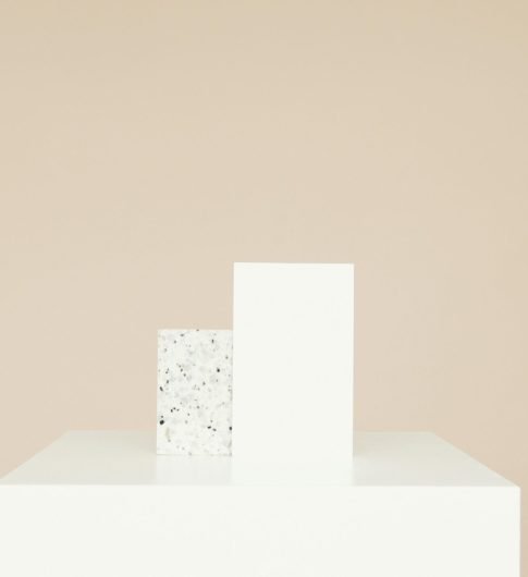 Simple minimalist mockup featuring two blocks on a neutral background.